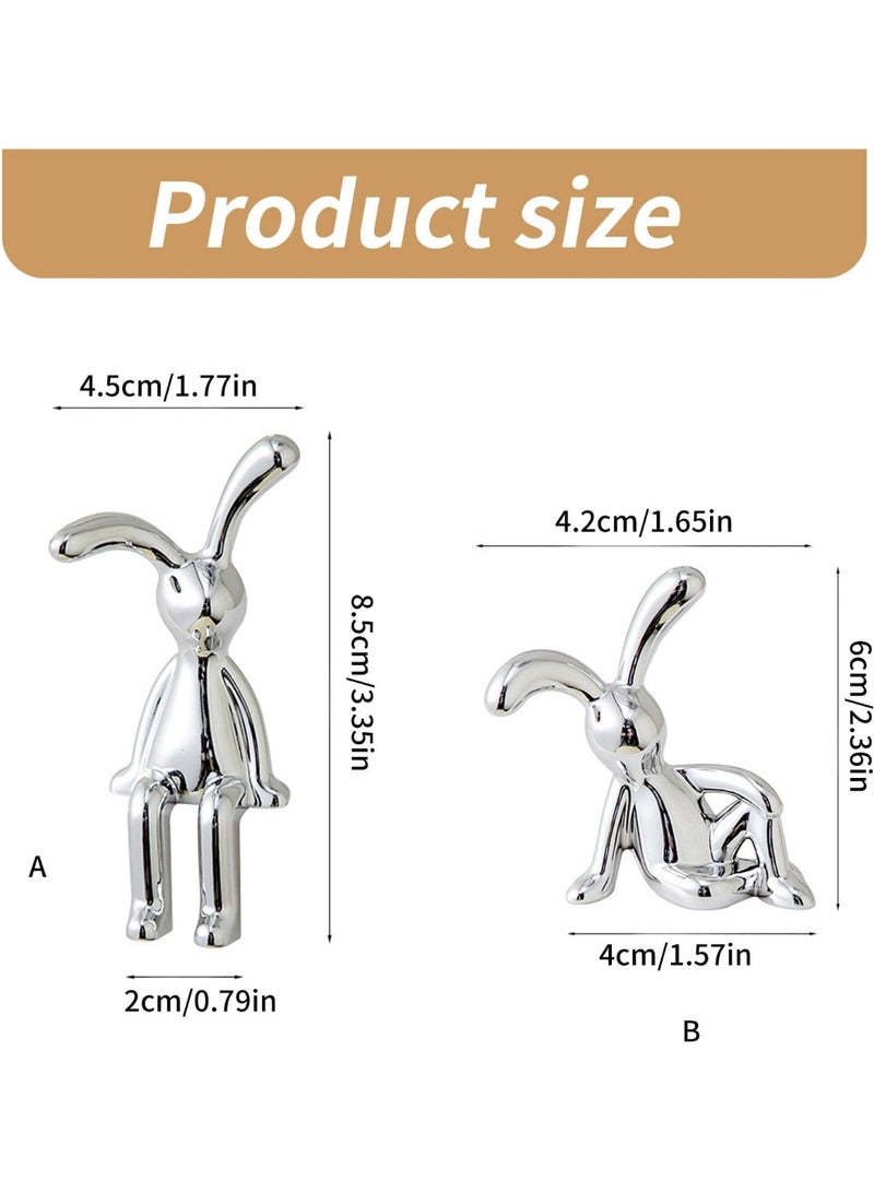 طقم يتكون من 4 قطع من تماثيل الأرانب اللاصقة لتزيين المنزل والسيارة والمكتب، تصميم لطيف بأرجل طويلة سهل الالتصاق على الأسطح الأملسة، زخرفة لوحدة التحكم في المنتصف، وزينة داخلية مخصصة لسيارة داخلية ممتعة ومرحة. - Image 2