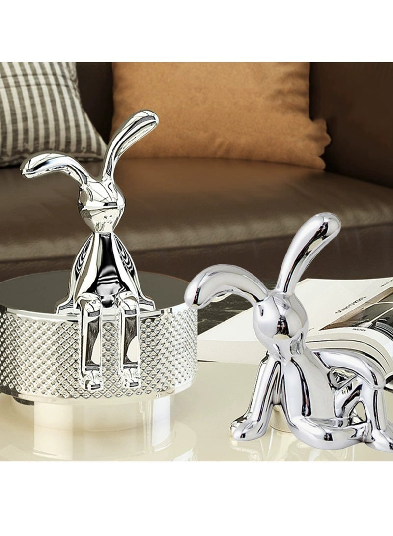 طقم يتكون من 4 قطع من تماثيل الأرانب اللاصقة لتزيين المنزل والسيارة والمكتب، تصميم لطيف بأرجل طويلة سهل الالتصاق على الأسطح الأملسة، زخرفة لوحدة التحكم في المنتصف، وزينة داخلية مخصصة لسيارة داخلية ممتعة ومرحة. - Image 4