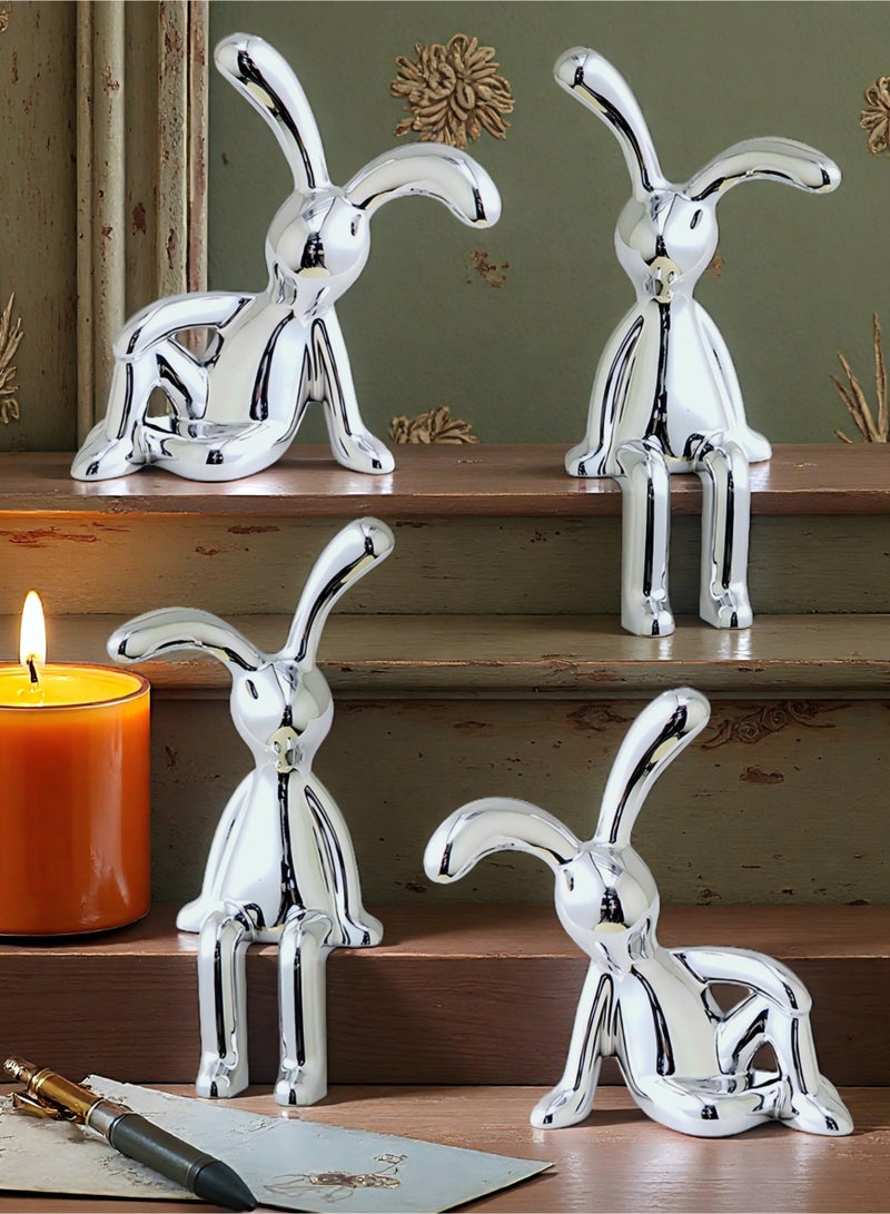 طقم يتكون من 4 قطع من تماثيل الأرانب اللاصقة لتزيين المنزل والسيارة والمكتب، تصميم لطيف بأرجل طويلة سهل الالتصاق على الأسطح الأملسة، زخرفة لوحدة التحكم في المنتصف، وزينة داخلية مخصصة لسيارة داخلية ممتعة ومرحة. - Image 1