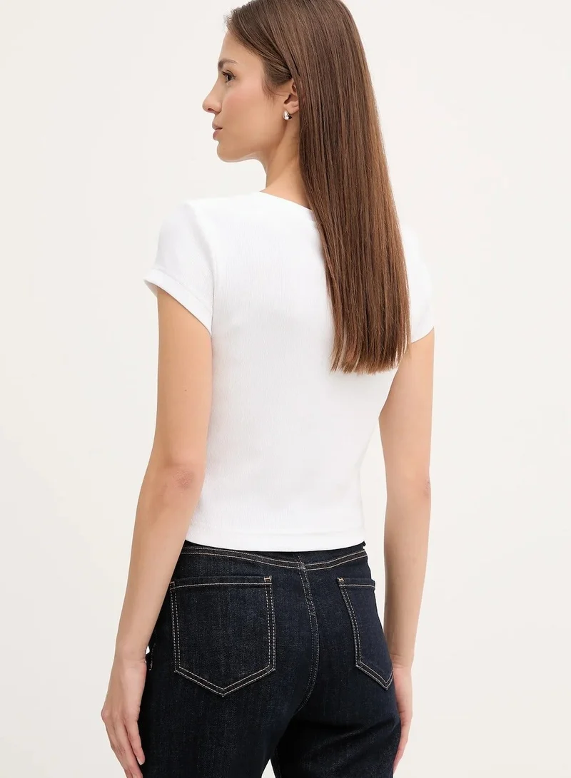 Calvin Klein Jeans  Slim Ribbed Cotton V-neck T-shirt for Women | Best Price UAE