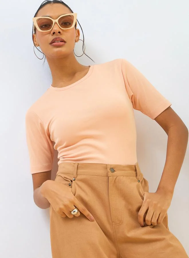 Sassafras  SASSAFRAS Peach Ribbed Short Sleeves Top for Women | Best Price UAE