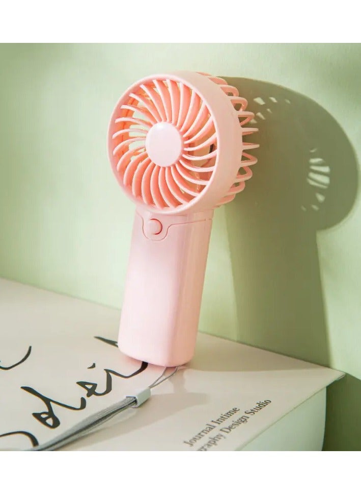 Ucanbe مروحة محمولة صغيرة تعمل بالبطارية، مروحة يدوية خفيفة الوزن - مثالية للمكتب، الهواء الطلق، السفر والتخييم - ابقَ بارداً في أي وقت، وفي أي مكان! (تتطلب بطاريات AAA، غير مدرجة) - Image 1