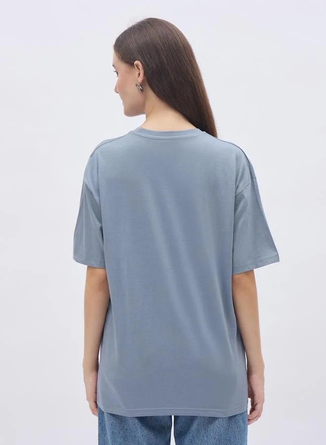Styli Women Blue Slogan Print Short Sleeve Oversized T-Shirt