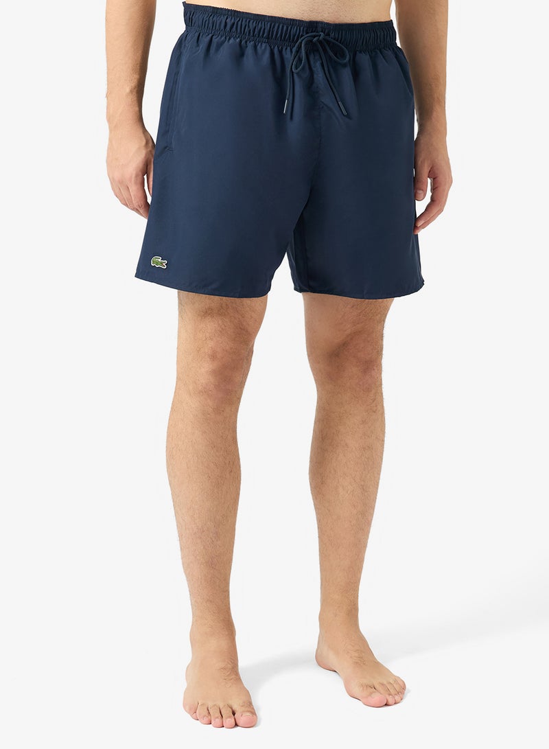 LACOSTE Monochrome Swim Trunks - Image 1