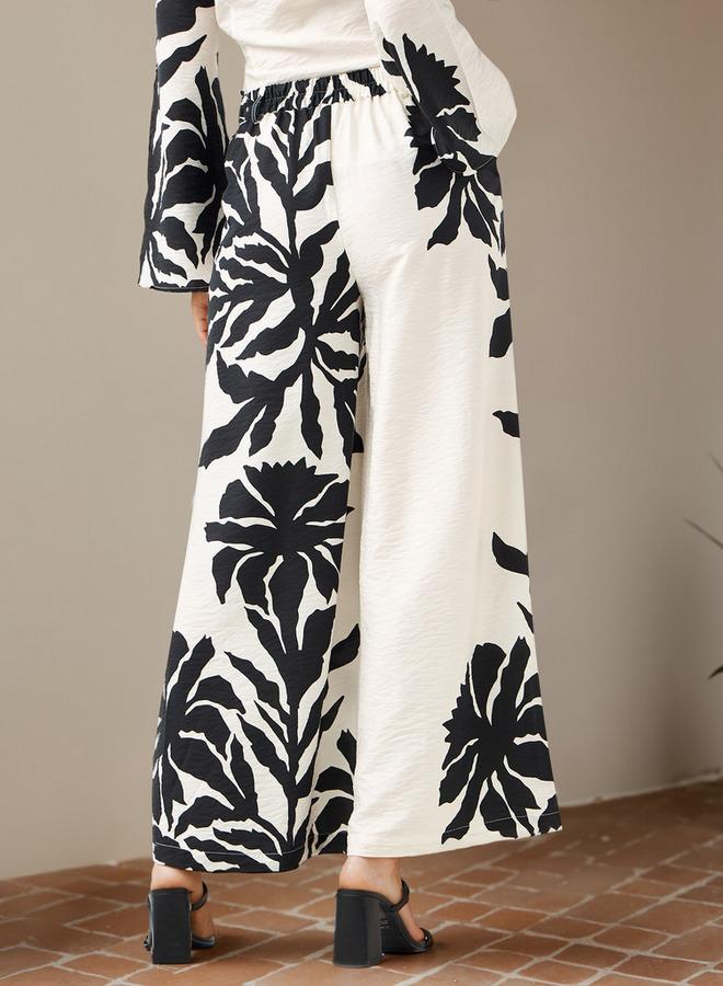 ايكونيك بنطلون بطيات مزدوجة بطبعة زهور أيقونية مع جيوب - Image 3