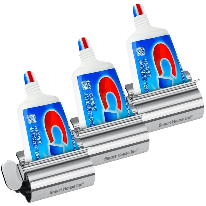 TOOTHPASTE SQUEEZER TUBE ROLLER STAINLESS STEEL TUBE SQUEEZER ROLLERS SAVES TOOTHPASTE CREAMS PUTS AN END TO WASTE SIMPLE AND PRACTICAL SILVER