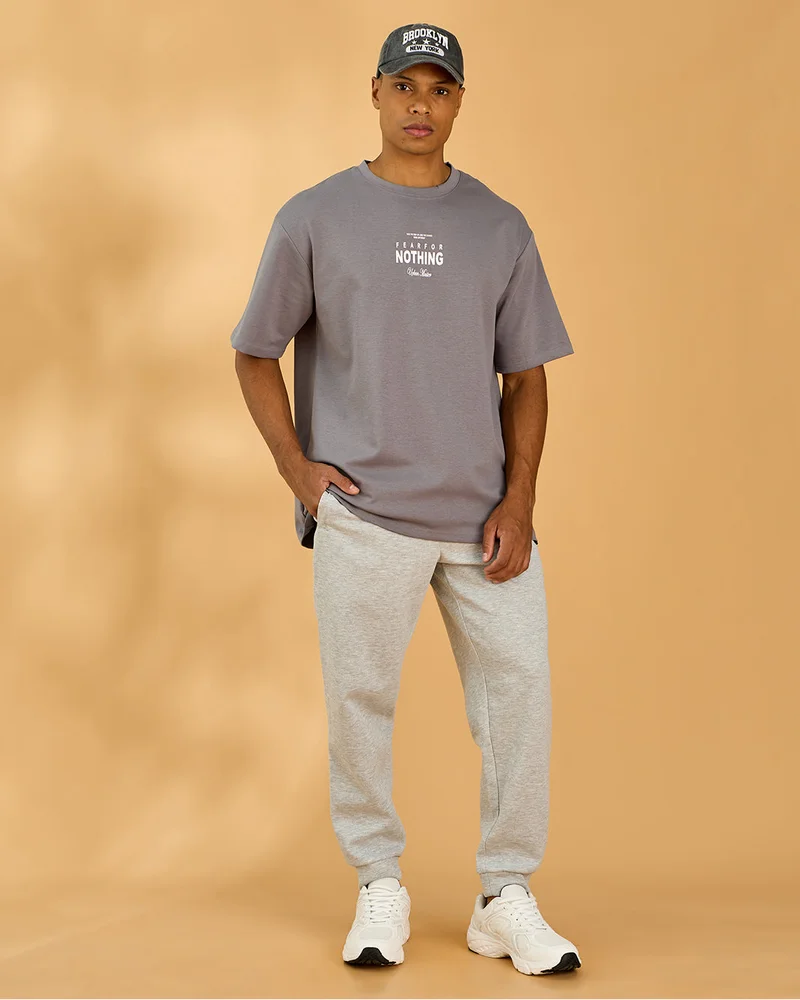Redtag Men Grey Placement Print Jogger Pants