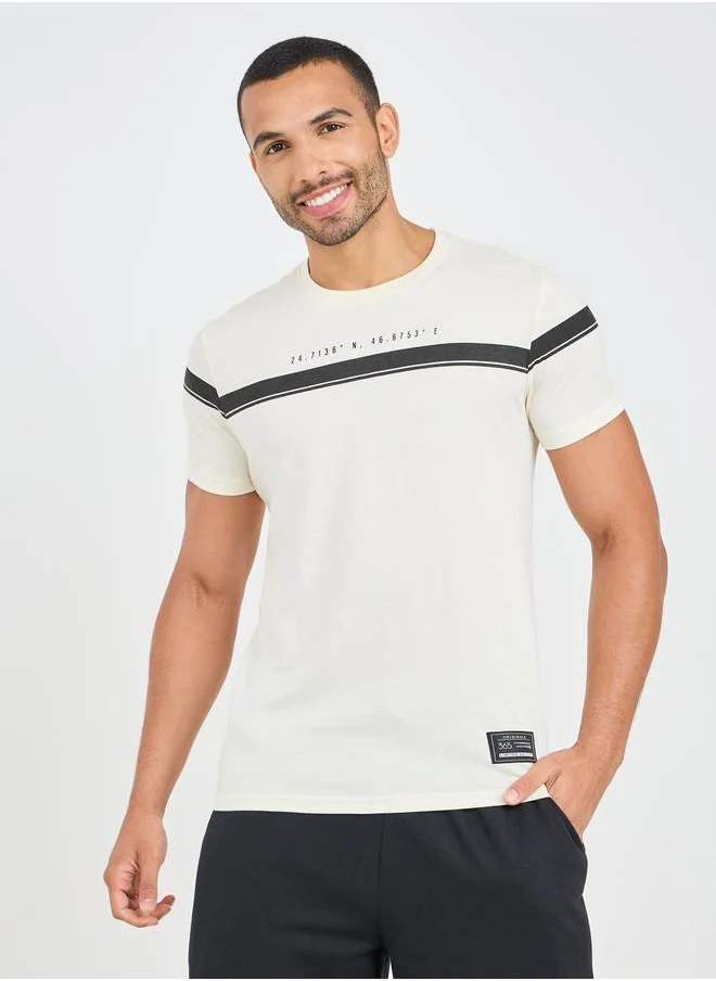 Styli Styli Contrast Panel Slogan Print Regular Fit T-Shirt with Badge Detail