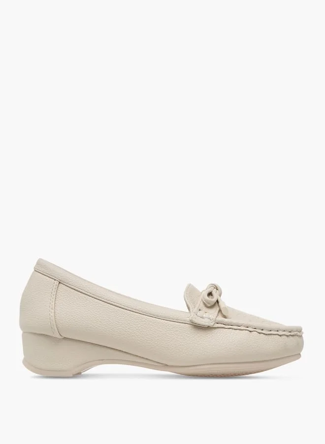 Women's Embossed Monogram Slip-On Loafers