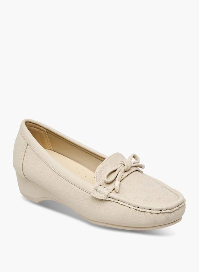 Women's Embossed Monogram Slip-On Loafers