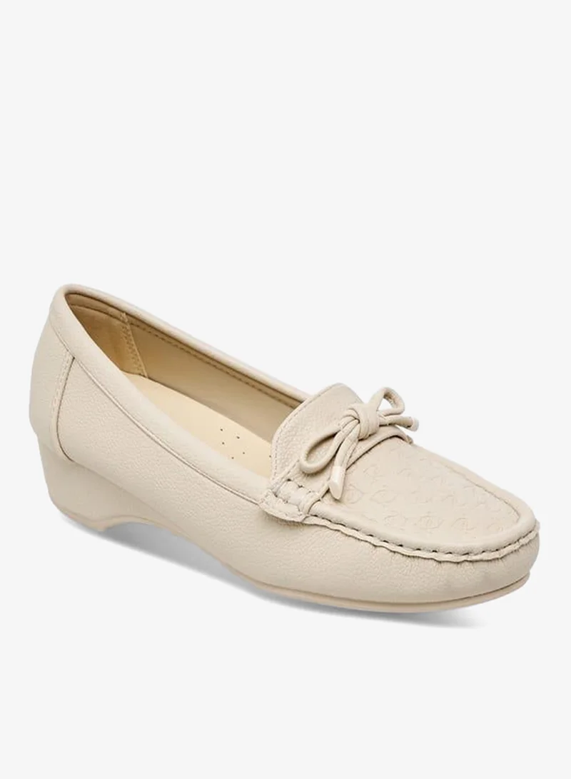 Women's Embossed Monogram Slip-On Loafers