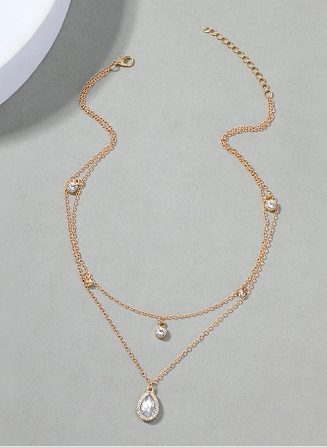 قلادة بوهيمية  لحفل زفاف ذات طبقات متعددة بأحجار سيز  الصغيرة – باللونين الفضي والأصفر الذهبي – متوهجة. قلادة مع رمز مضيء على شكل دمعة من الكريستال الصغيرة والناعمة، وبرمز دائري صغير ذو نقاط، ومؤخرة من الريهستون . شريطرقبة  بسيطة ذو سلسلة رفيعة، ناعمة ومُبسطَة  مصممة للمرأة. - Image 4