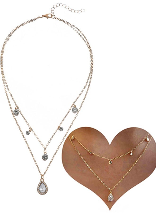 قلادة بوهيمية  لحفل زفاف ذات طبقات متعددة بأحجار سيز  الصغيرة – باللونين الفضي والأصفر الذهبي – متوهجة. قلادة مع رمز مضيء على شكل دمعة من الكريستال الصغيرة والناعمة، وبرمز دائري صغير ذو نقاط، ومؤخرة من الريهستون . شريطرقبة  بسيطة ذو سلسلة رفيعة، ناعمة ومُبسطَة  مصممة للمرأة. - Image 2