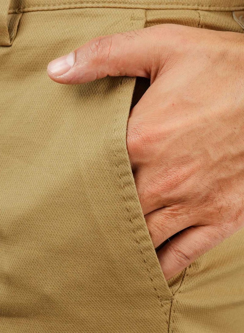 جيوردانو بنطلون كاكي قطني بقصة ضيقة وخصر منخفض للرجال - Image 4