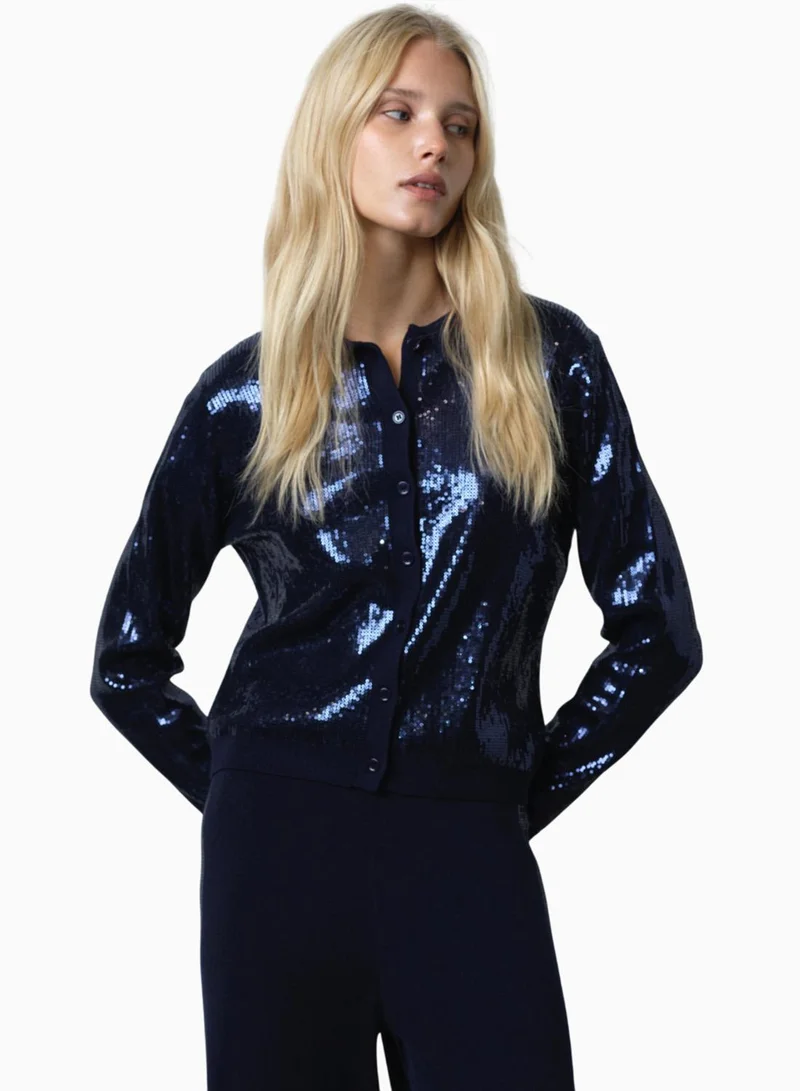 فرنش كونكشن بلوزة بأكمام طويلة مزينة بالترتر بأزرار من هانا