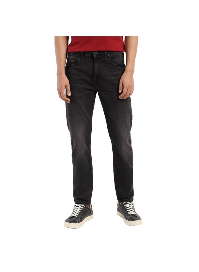 ليفايز بنطلون جينز Levi's 512 للرجال بقصّة Slim Taper Fit ومتوسط الارتفاع وبلون فاتح قابل للتمدد باللون الأسود - Image 1