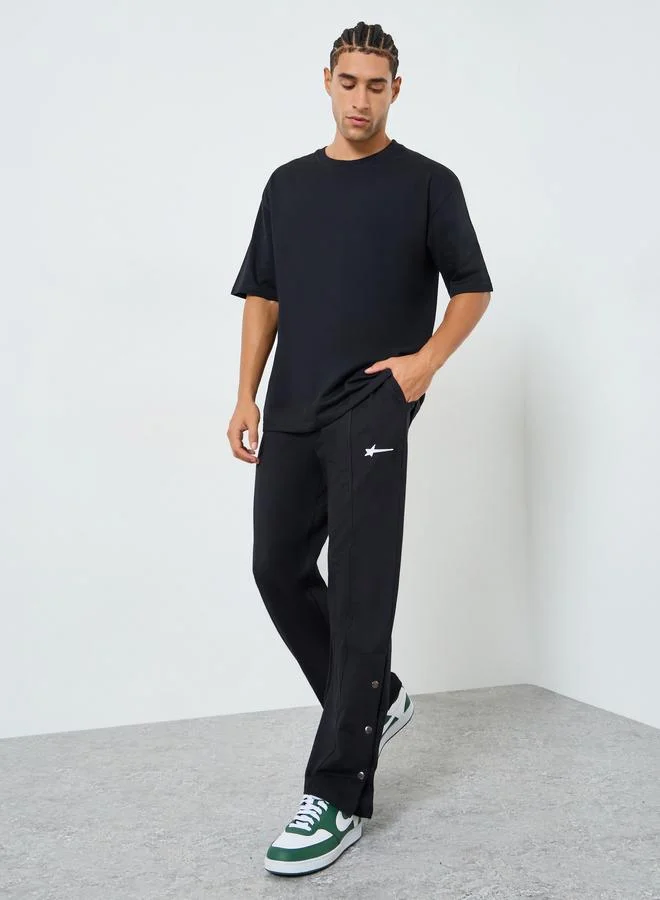 Styli Men Black Oversized Tennis Graphic Jersey T-Shirt