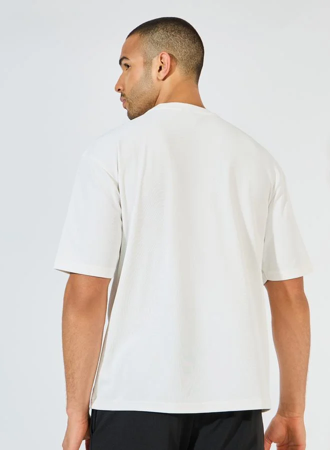 Styli Oversized Slogan Training T-Shirt with Pintuck Detail