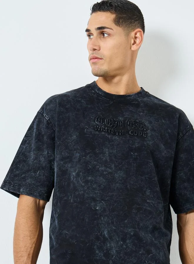 Styli Acid Wash Oversized Terry T-Shirt with Embossed Print