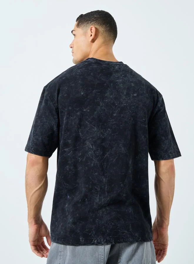 Styli  Styli Acid Wash Oversized Terry T-Shirt with Embossed Print for Men | Best Price UAE