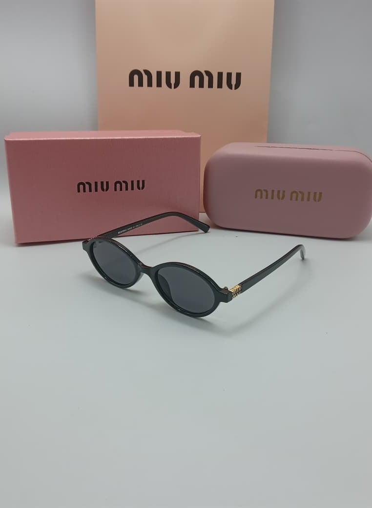 Miu Miu women's sunglasses with an oval frame and black lenses, with accessories