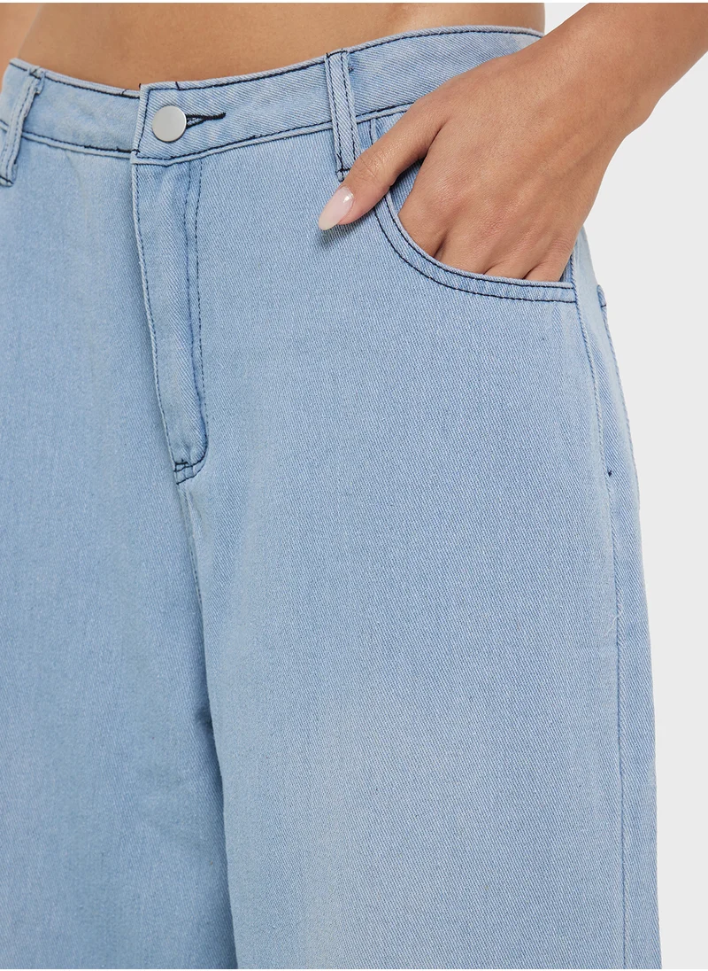 جينجر Mid Rise Wide Leg Jeans With Frayed Hem