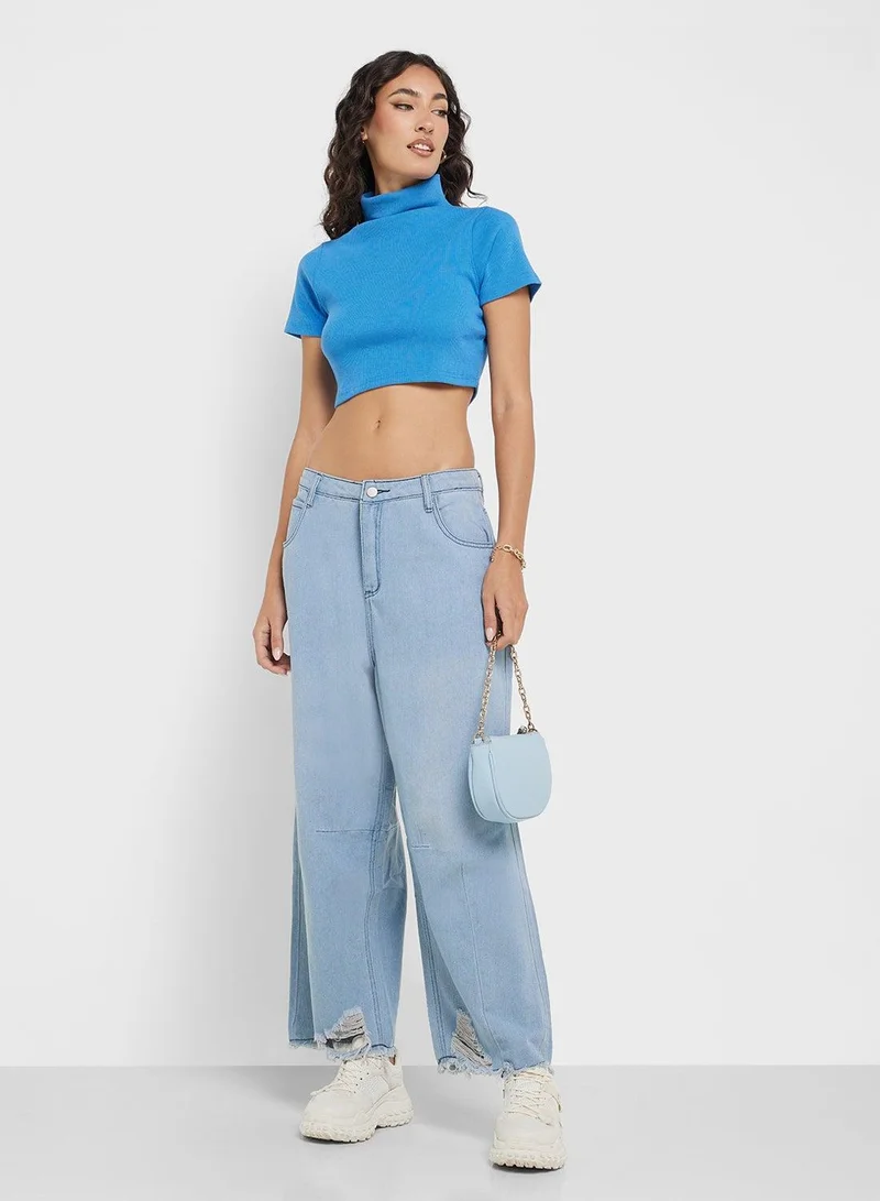 Mid Rise Wide Leg Jeans With Frayed Hem