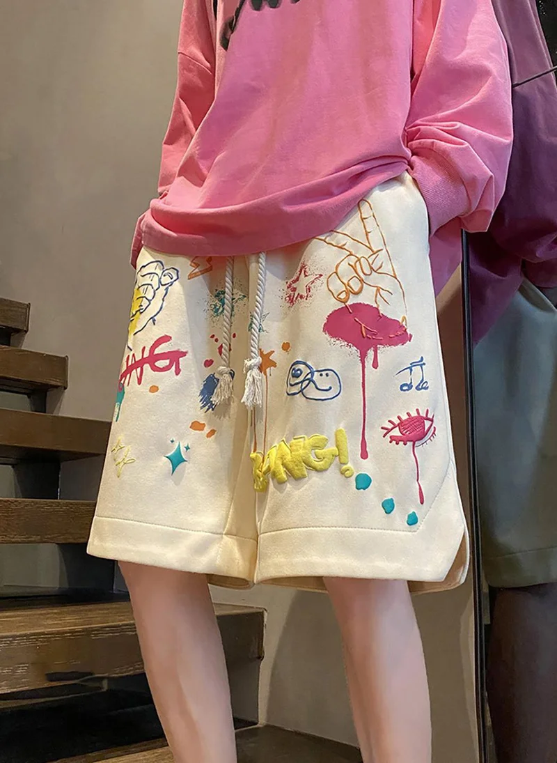 يونيكي Off White Casual Mid-Rise Printed Shorts