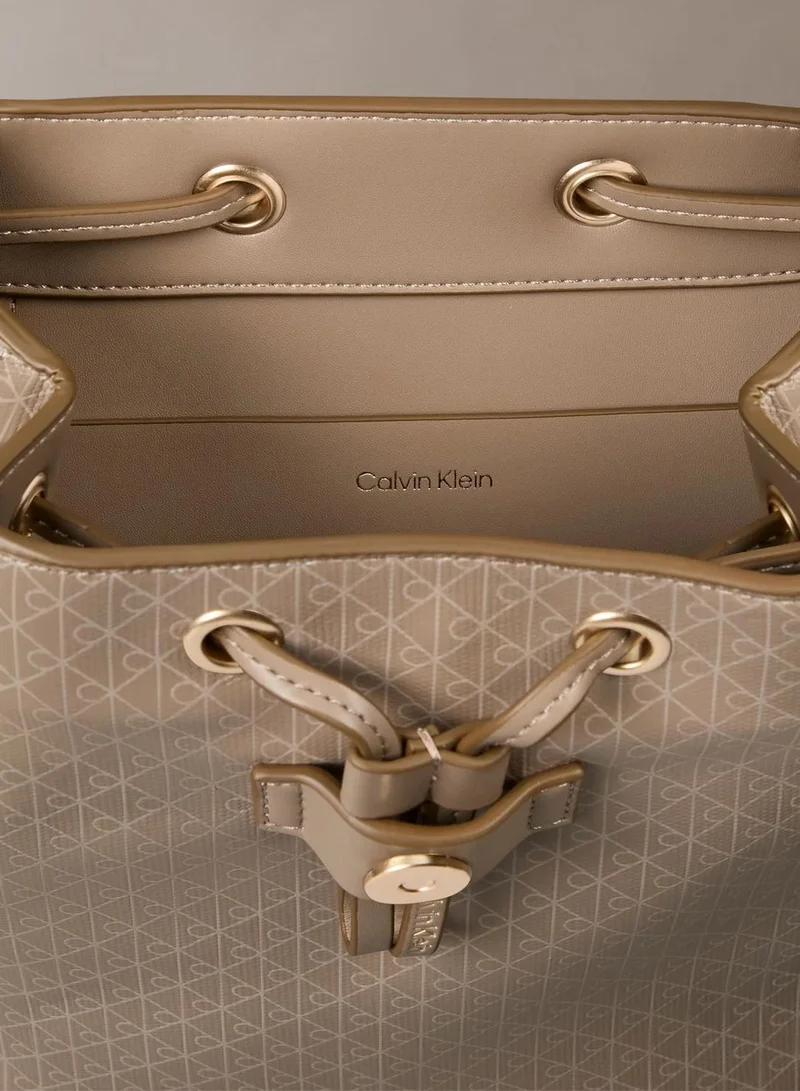 Calvin Klein DESERT TAUPE AOP Allover Emblem Logo Mini Backpack for Women | Best Price UAE