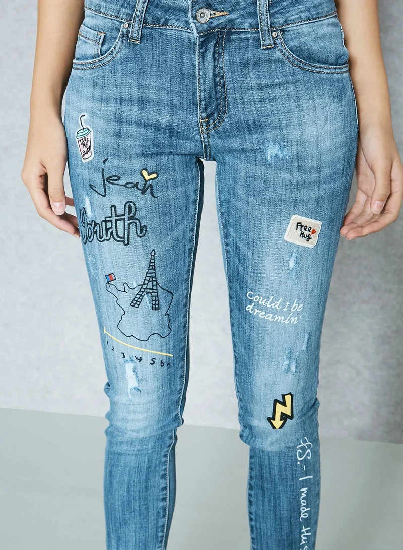 Ginger Badge Slogan Skinny Jeans