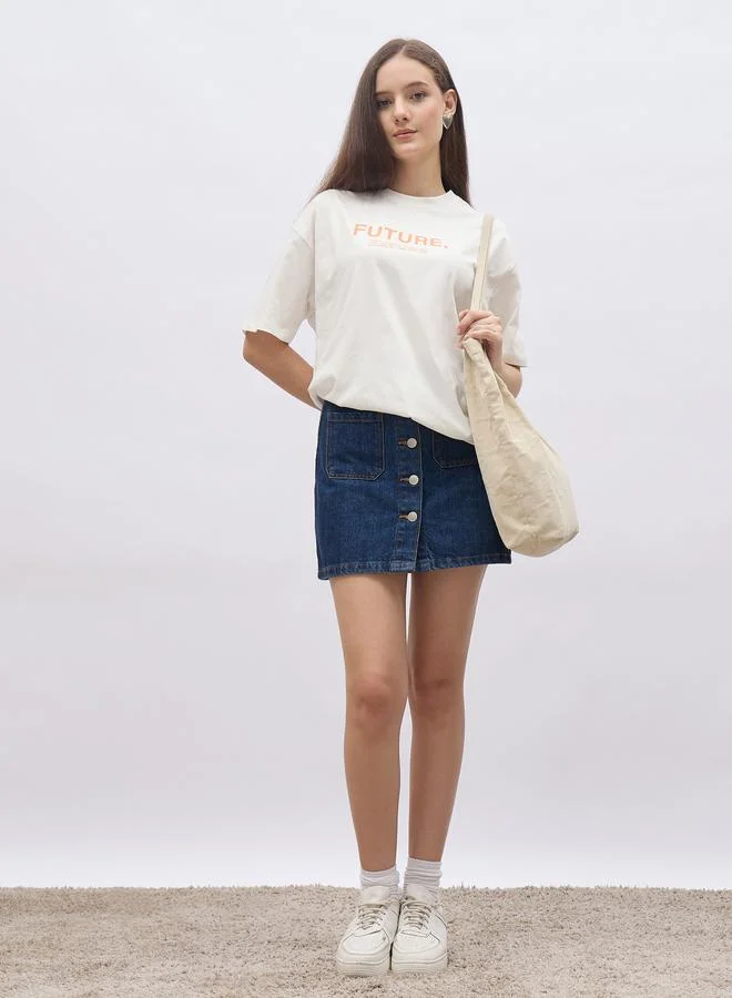 ستايلي Styli Women Cream Slogan Print Short Sleeve Oversized T-Shirt