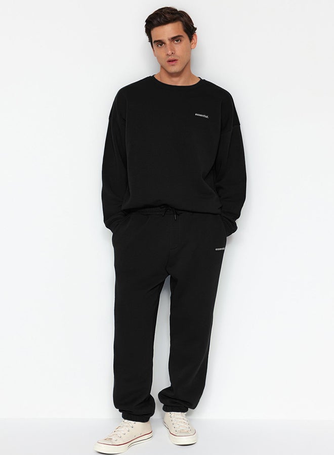 trendyol Black Oversize/Wide Cut Text Printed Warm Sweatshirt Tracksuit TMNAW24EM00004 - Image 2