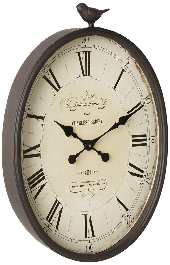 CREATIVE COOP OVAL METAL WALL CLOCK WITH BIRD
