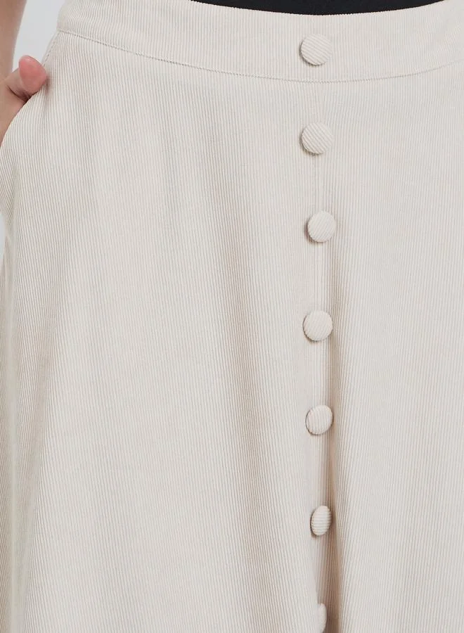 Styli Cream Styli Buttoned Down A-Line Midi Skirt with Pockets for Women | Best Price UAE