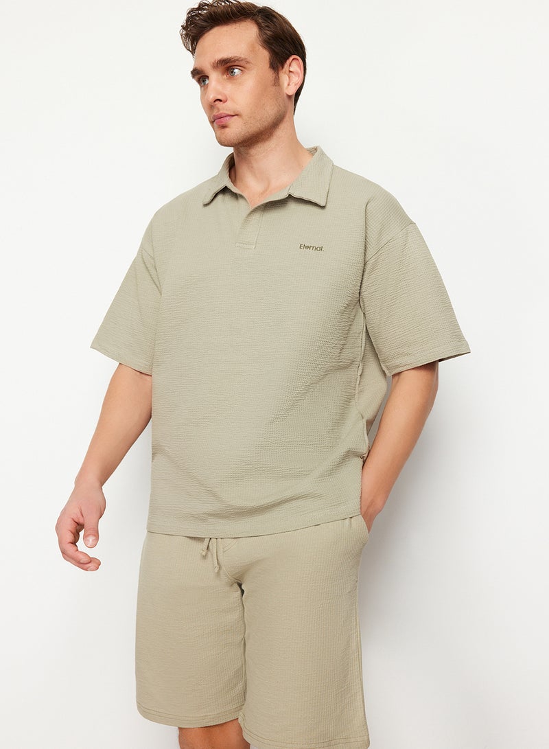 trendyol Premium Stone Oversize/Wide Cut Text Embroidery Textured Polo Neck T-Shirt Tmnss24Po00011 - Image 1