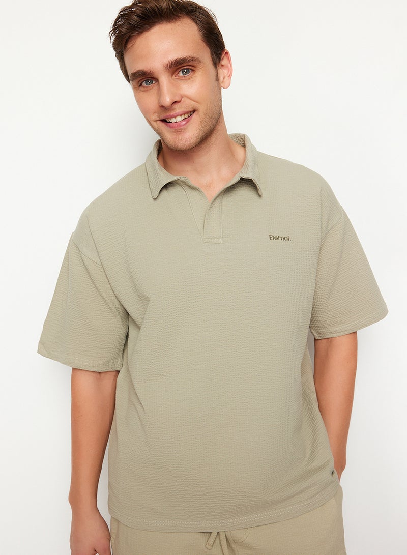 trendyol Premium Stone Oversize/Wide Cut Text Embroidery Textured Polo Neck T-Shirt Tmnss24Po00011 - Image 2