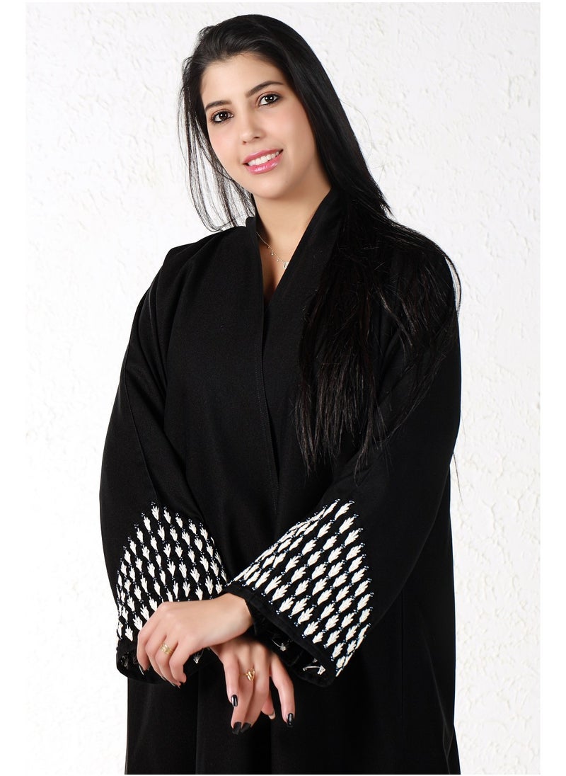 Gaiyda - Black abaya with white embroidery on the sleeves - Image 1