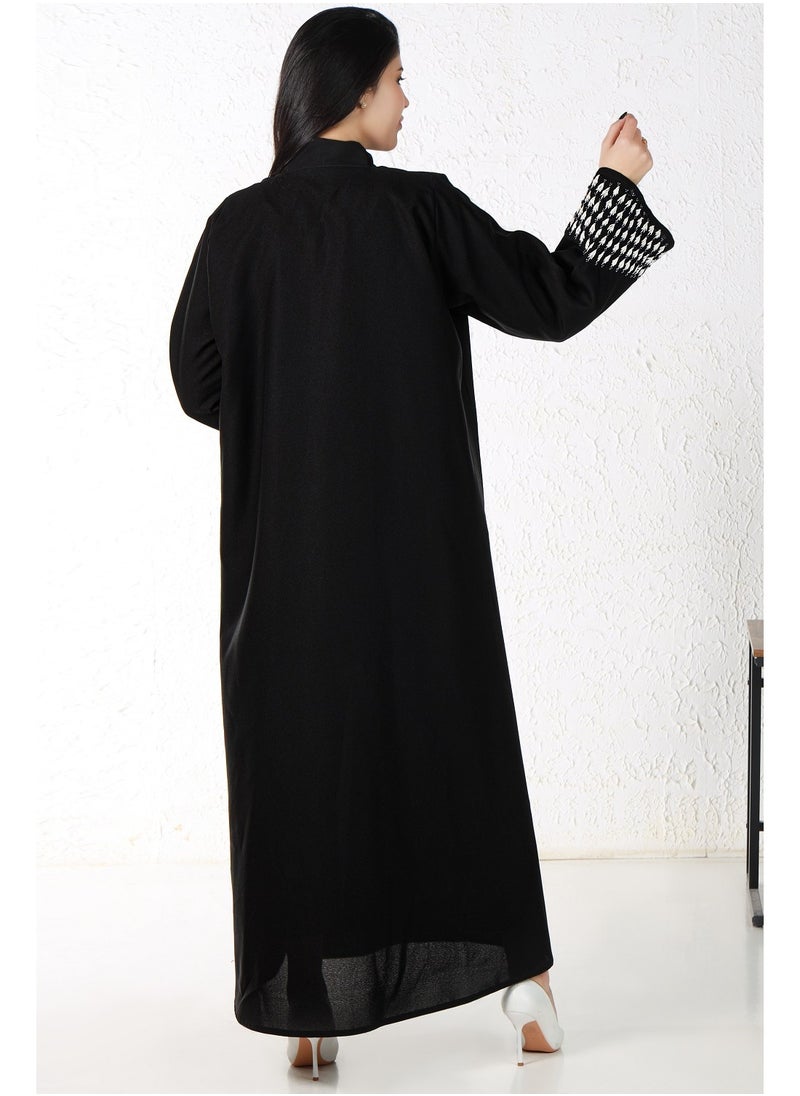 Gaiyda - Black abaya with white embroidery on the sleeves - Image 1