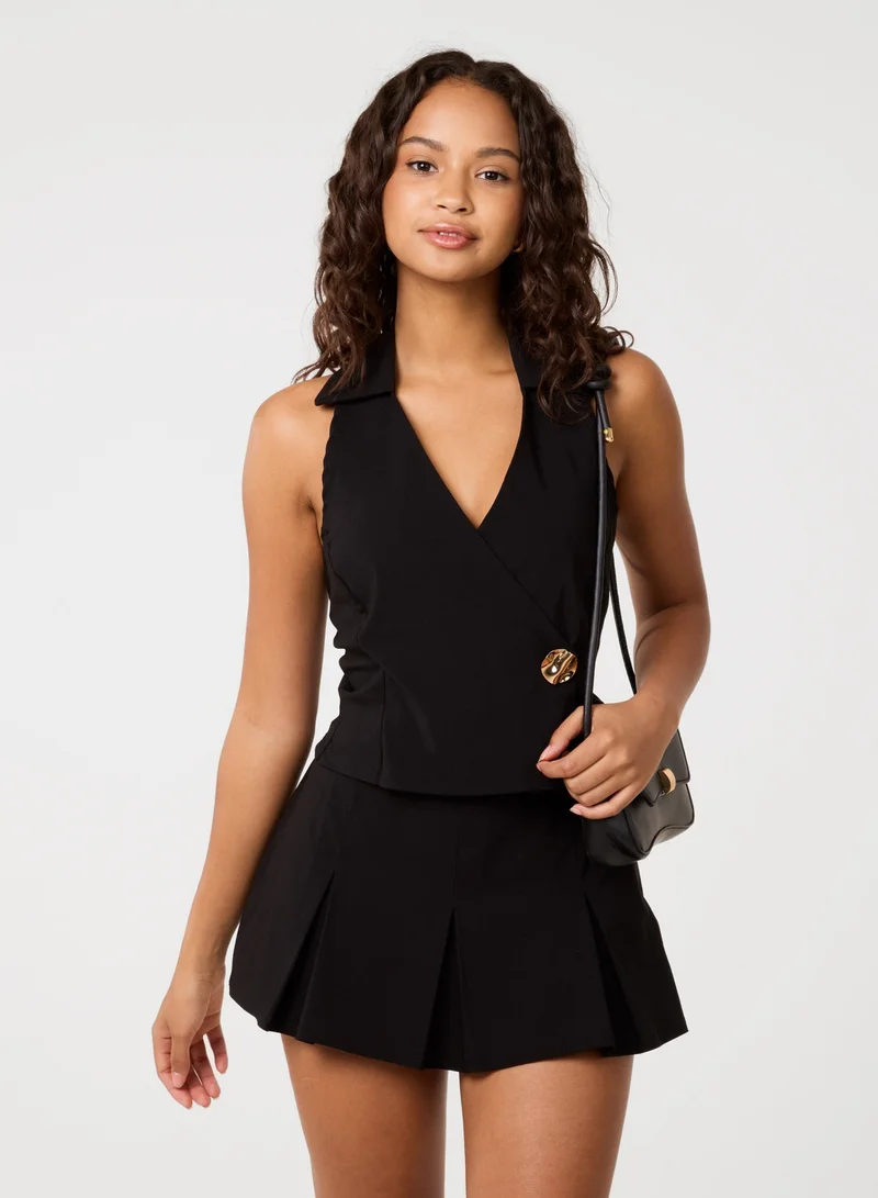 بينك فانيلا بلوزة بياقة هالتر بإبزيم ذهبي