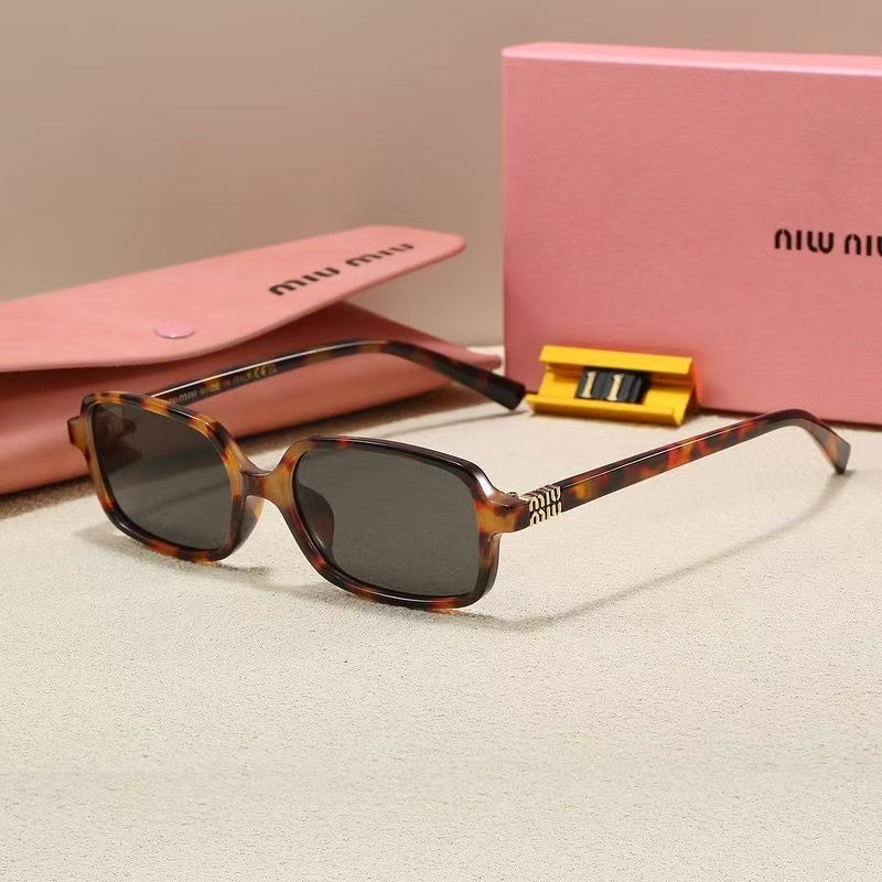 Miumoon Italian-made Miu Miu oval luxury cycling sunglasses for women. - Image 1