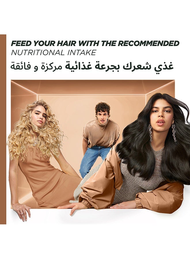 غارنييه ماسك غذاء الشعر بالجوز الهند للشعر النافش+ منشفة - Image 2