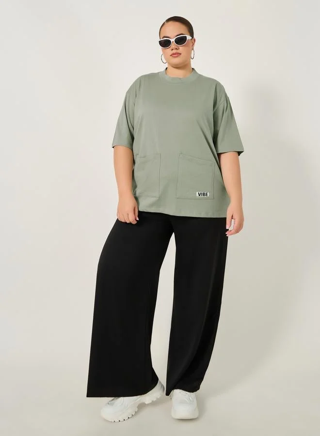 Styli Plus Size Round Neck Oversized T-Shirt with Utility Pockets