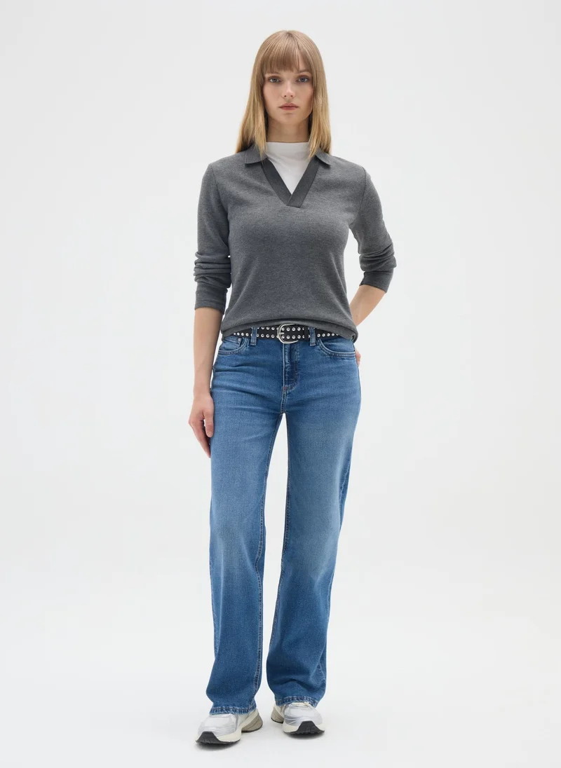 او في اس بولو رمادي بأكمام طويلة من أو في إس