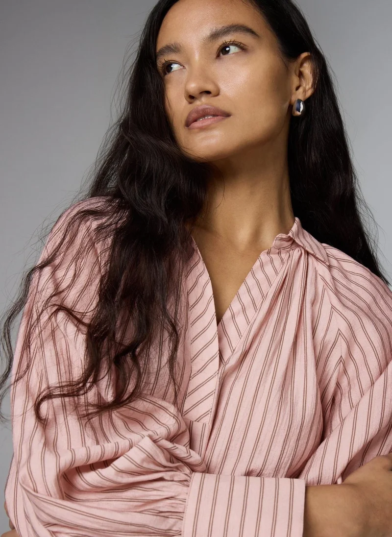 ماتلان بلوزة بأكمام منتفخة وخطوط وردية من إت يو