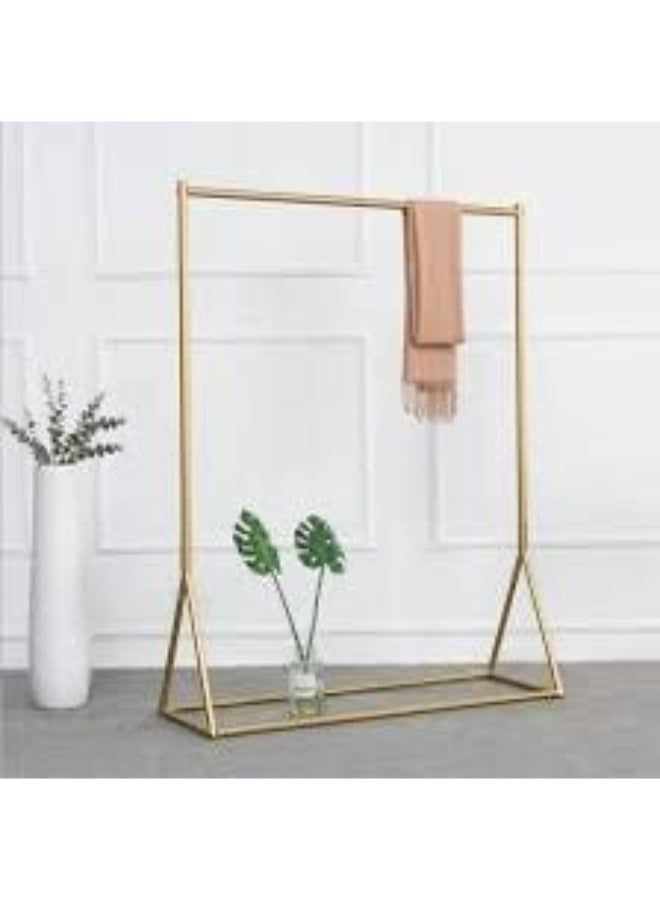Modern, distinctive, gold-colored steel hanger