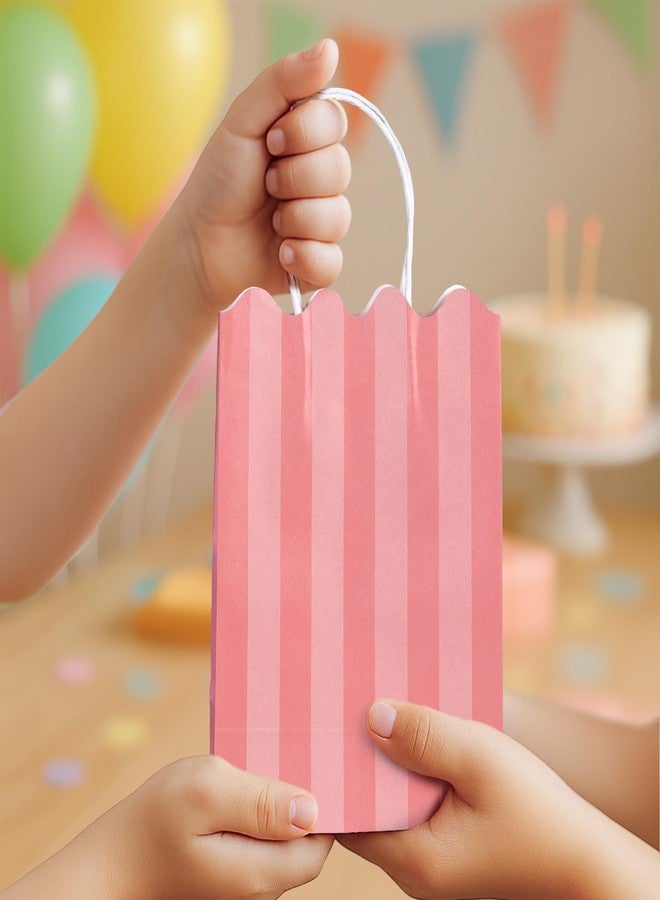 Confettiville أكياس هدايا صغيرة بمقابض، عبوة من 12 كيسًا ورقيًا لتوزيعات الحفلات، 5.82 × 3.15 × 8.18 بوصة، 6 تصاميم بخطوط حلوى القطن، مثالية لأعياد الميلاد وحفلات استقبال المولود وحفلات الكريسماس - Image 3