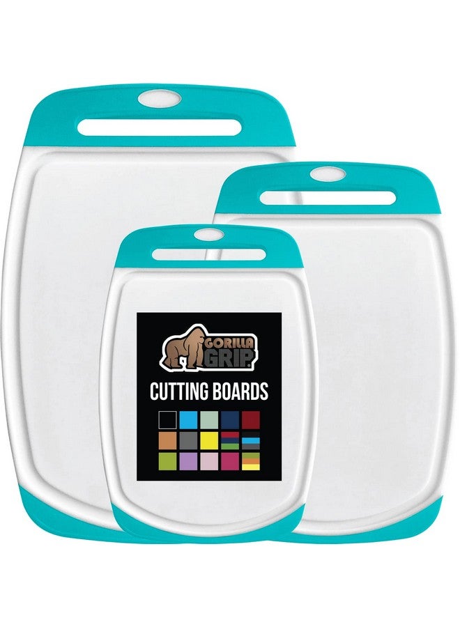 GORILLA GRIP 100% BPA-Free Reversible Kitchen Cutting Board Set of 3, Nonporous, Juice Grooves to Catch Liquid, Slip Resistant Handle Border, Dishwasher Safe Durable Food Chopping Boards, Turquoise - Image 1
