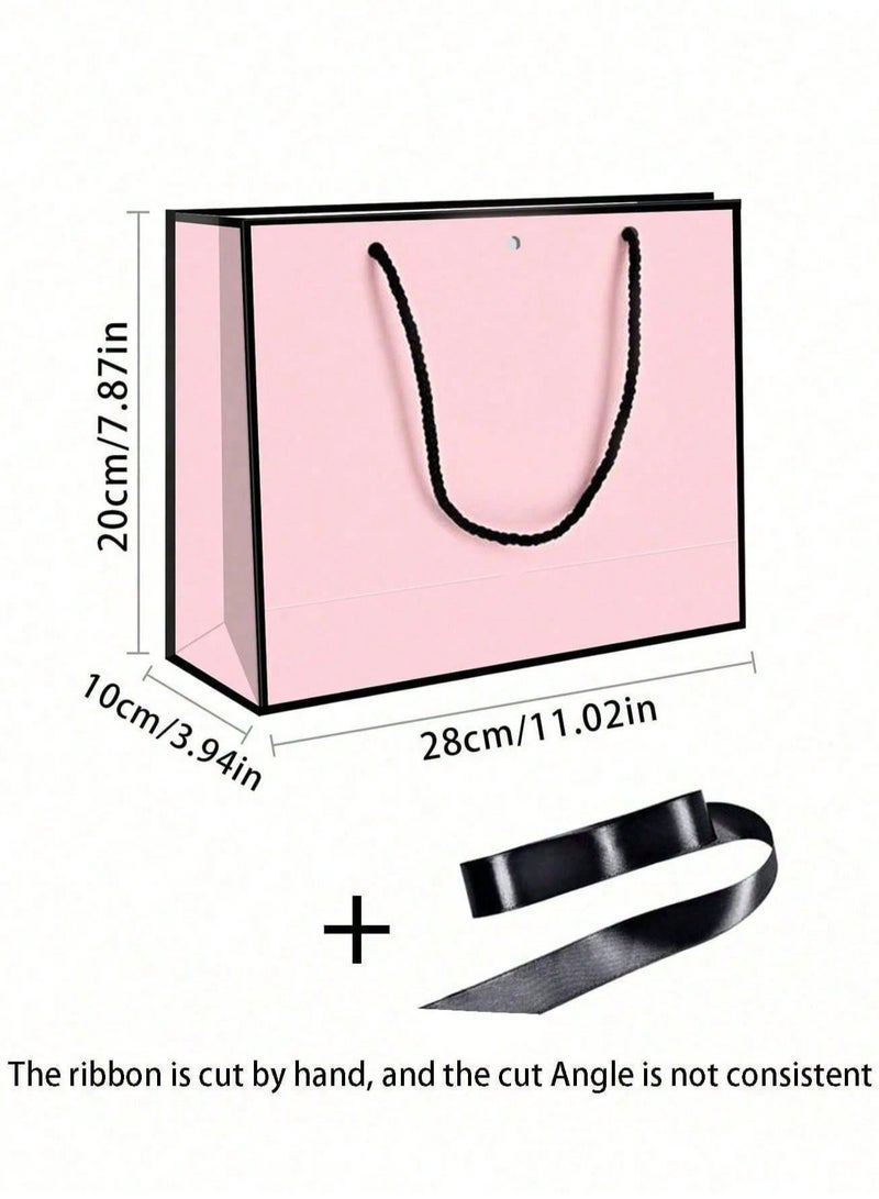 2 Kraft paper gift bags with black twisted rope handles and a black silk satin ribbon to close the bag. Perfect for presenting meaningful gifts for weddings and bachelorette parties. - Image 2