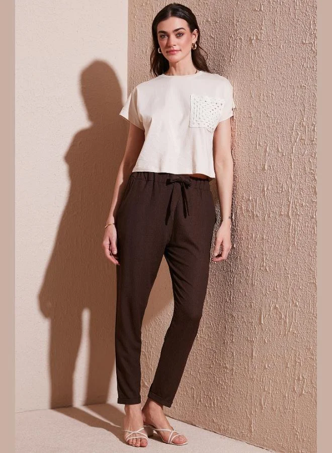 ليلا بنطلون نسائي قصير الأرجل بخصر معقود وجيوب بقصة ضيقة