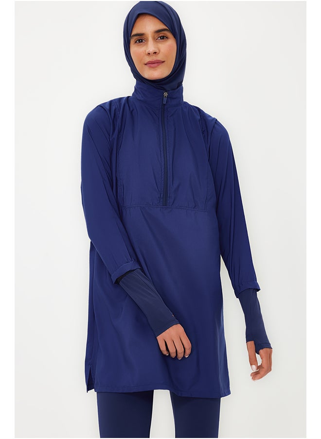 trendyol طقم ملابس سباحة من 4 قطع من الليكرا المحبوكة بالكامل باللون الأزرق الداكن TCTSS23CF00000  - Image 2
